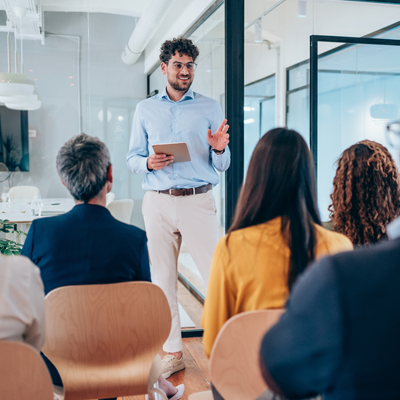 Businessman leading a training class for professionals.